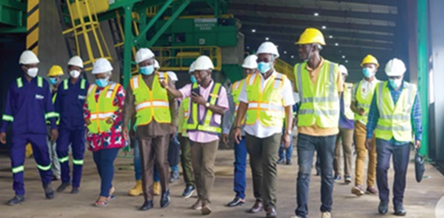The committee being conducted around the recycling plant The committee being conducted around the recycling plant