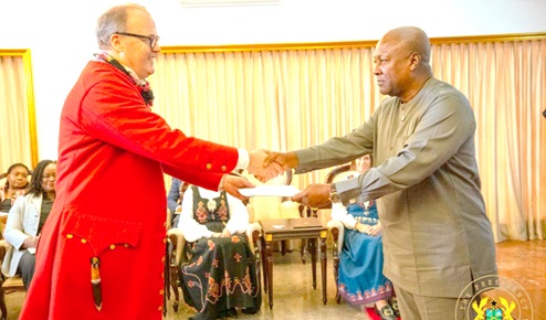 Dr John Mikal Kvistad, Ambassador of Norway, presenting his credentials to President Mahama
