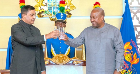 President Mahama proposing a toast with Najeeb Durrani, Pakistani High Commissioner 