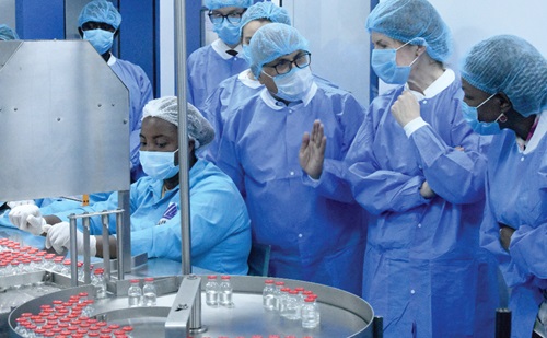 Dhananjat Tripathi (3rd from left), Chief Executive Officer, Atlantic Lifesciences Limited, briefing Baroness Chapman (2nd from right), UK Minister of State, International Development, and Dr Grace Ayensu-Danquah (right), a Deputy Minister of Health, during a tour of Atlantic Lifesciences Limited at Prampram.. Pictures: SAMUEL TEI ADANO