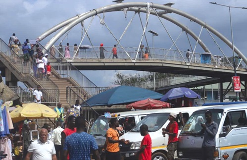 Some residents at  Tech Junction in Kumasi, boarding vehicles to their various destinations, as economic activities in Kumasi resume after the funeral of the late Asantehemaa,  Nana Konadu Yiadom III  PICTURES: EMMANUEL BAAH