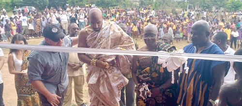 Michael Myles Pratt (2nd from left), City Life Church team, and Okatakyi Amenfi (2nd from right) cutting the tape to inaugurate the renovated facilty. BELOW: The renovated school block