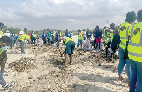Some volunteers collecting marine debris and solid waste at the Laboma Beach Resort in Accra Some volunteers collecting marine debris and solid waste at the Laboma Beach Resort in Accra