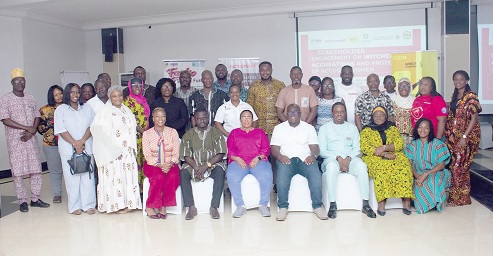 Members of the committee with participants in the event
