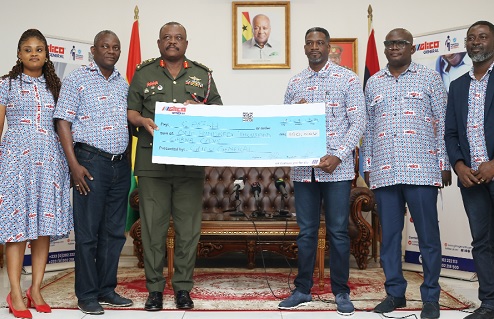 Andrew Acheampong Kyei (3rd from right), Managing Director, Glico General, presenting a dummy cheque to Lieutenant General William Agyapong (3rd from left), Chief of Defence Staff (GAF), Ghana Armed Forces. With them are Charles Mensah (2nd from left), Chief Operations Officer, Roland Atamalu Baba (2nd from right), Divisional Head-Energy and Power, Frederick Adu Asare (right), Head of Info-Technology, and Ophelia Amanor (right), corporate Affairs, all of Glico General. Picture: BENEDICT OBUOBI