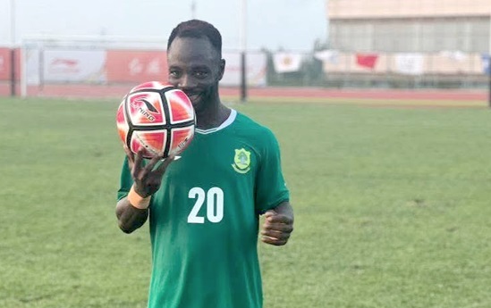 UDS striker, Augustine Frimpong, with the match ball after scoring a hatrick against the Koreans