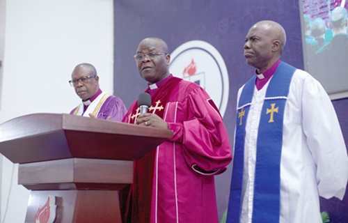 Rev. Enoch Nii Narh Thompson (middle),  President of the Ghana Baptist Convention, addressing the church 