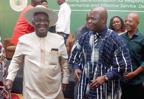 Ahmed Ibrahim (right), Minister of Local Government, Chieftaincy and Religious Affairs, interacting with Prof. Kwamena Ahwoi (left), Chair, Technical Committee, Inter-Ministerial Coordinating Committee on Decentralisation, at the forum. Picture: ELVIS NII NOI DOWUONA 