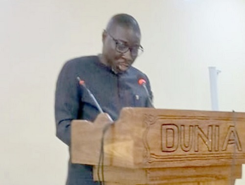 Edwin W. Harris Jr. (inset), Director-General of GIABA; addressing participants 