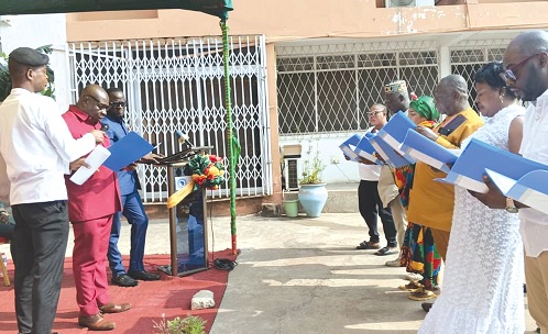 John Nana Owu, Tema Metropolitan Coordinating Director, swearing in the newly appointed councillors of the Tema Central Sub-Metro District Council