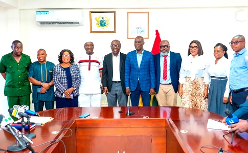 Haruna Iddrisu (5th from right), Minister of Education, flanked by Prof. Ernest Kofi Davis (5th from left), Director-General, GES, and Kofi Asare (4th from right), Chairman of the PTA Committee. Others include members of the committee  