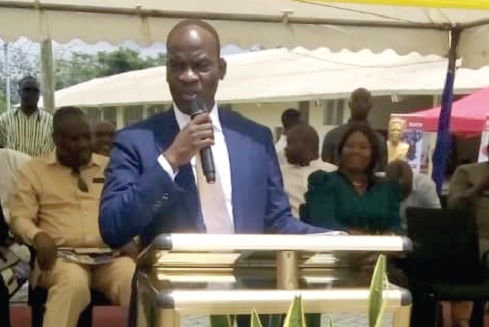 Haruna Iddrisu (inset), Minister of Education, addressing the graduates  