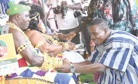 Nene Dr Tei-Djahene Korabo IV (left), Senior Asafoatse of the Shai Traditional State and Chief of Manya Jorpanya, welcoming Ignatius Dordoe, District Chief Executive, to the 2025 Ngmayem Festival at Manya Jorpanya. Picture: SAMUEL TEI ADANO