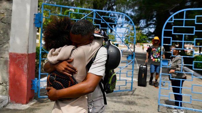 Inmates emerged from La Lima prison in eastern Havana to hug waiting relatives