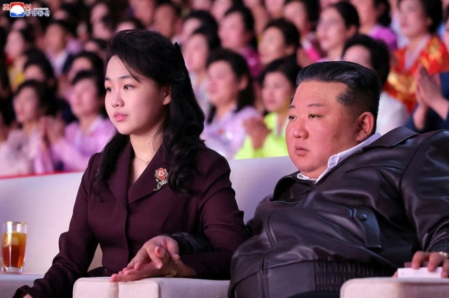 North Korean leader Kim Jong Un and his daughter Kim Ju Ae attend a performance commemorating International Women's Day in Pyongyang, North Korea. KCNA via REUTERS