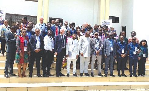 Dignitaries and participants in the International Conference on the Political Economy of Just Energy Transitions and Inequality in Africa held at the University of Ghana