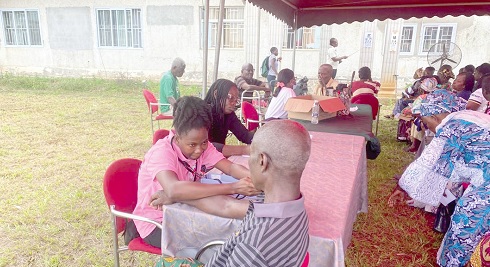 Some of the health personnel examining some of the constituents during the screening at Oda New Town