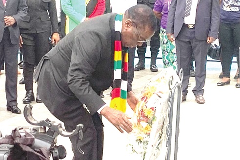 Dr Emmerson Mnangagwa, the President of Zimbabwe, laying the wreath at the Kwame Nkrumah Mausoleum and Memorial Park