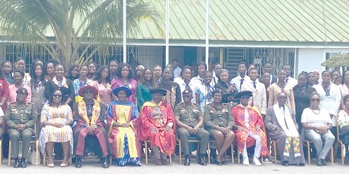 Air Marshal Dr Felix Adom Asante (4th from left), President, National Defence University; Prof. Rosemary Aboagye Boohene (5th from left), former Pro Vice-Chancellor of UCC; Major Bright Attah Addae (4th from right), Principal of the college, and some students at the matriculation ceremony