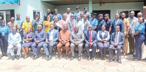 Anthony Kwasi Sarpong (seated 4th from right), Commissioner-General, GRA, with Kweku George Rickettes-Hagan (seated 5th from right), Board Chairman, GRA, Theophilus Kwesi Ehun (seated 4th from left), National Chairman, GRAWU, some executive council members of GRAWU and other GRA commissioners. Picture: ERNEST KODZI