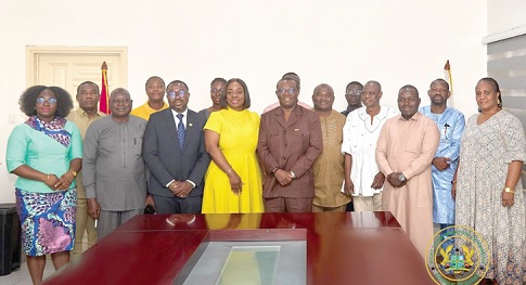 Emmanuel Kwasi Bedzrah (middle), Chairman, Parliamentary Caucus on Open Governance Partnership, Genevieve Shirley Lartey (4th from left), Christopher Doughan (3rd from left), member, Governing Board, RTIC, Kweku Sersah-Johnson (2nd from left), Technical Advisor, RTIC, with members of the Caucus and management staff of the RTIC