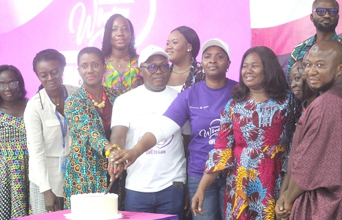 Sophia Tijani (3rd from left), President of the Institution of Engineering; Dr Kofi Adzroe (arrowed), Director-General of Ghana TVET Service; and Affi E. Agbenyo (3rd from right), Deputy Director-General of GTVETS, cutting a cake to inaugurate the project. Picture: ESTHER ADJORKOR ADJEI
