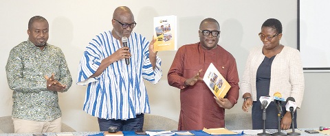 Prof. Henry Kwasi Prempeh (2nd from left), Executive Director of CDD Ghana, and Richard Ellimah, Chairman of PIAC, launching the 2025 PIAC Annual Report. With them are Edward Yaw Afriyie (left), Vice Chairman, PIAC, and Sena Dake, PIAC member 