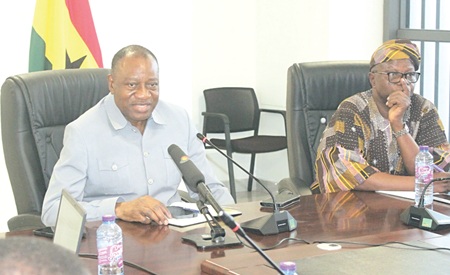 Dr Pelpuo Hassan Abdul Rashid, Minister of Labour, Jobs and Employment, addressing the meeting. Looking on is Hamidu Adakrugu (right), Chief Director, Ministry of Labour, Jobs and Employment.  Picture: ERNEST KODZI 