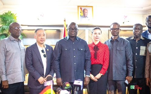 Eric Opoku (3rd from left), Minister of Food and Agriculture, and Ningquan Xu, Group Chairman of Sentuo Group, with officials of the ministry and the group