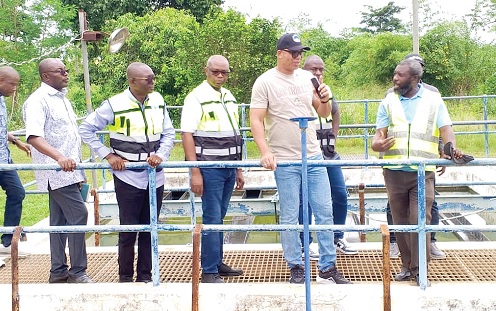 Adam Mutawakilu (2nd from right), Managing Director of the Ghana Water Limited, with the delegation of GWL officials at the Abesim Water Works