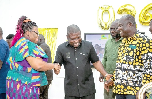 James Gunu (middle), Volta Regional Minister, in a hearty interaction with Prof. Lydia Aziato (left), UHAS Vice- Chancellor, and staff during the forum