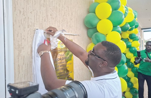 Julius Neequaye Kotey, CEO of DVLA, cutting the tape to inaugurate the Kasoa DVLA Ultra Centre