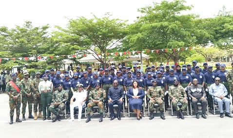 Officials from the National Service Authority, TDC Ghana Ltd, senior military officers of the 1st Infantry Battalion and the trainees after the parade