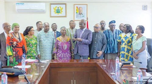 Haruna Iddrisu (5th from right), Minister of Education, interacting with Dr Christine Amoako-Nuamah (4th from left), Chair of the committee, and other members after the inauguration