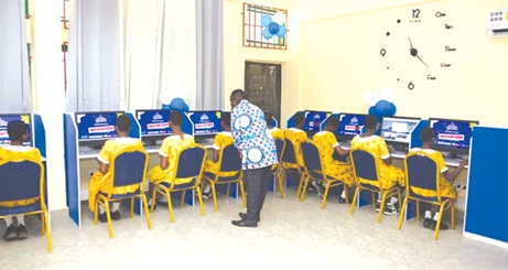 Students of Quaye Nungua R/C Basic School using the refurbished ICT lab