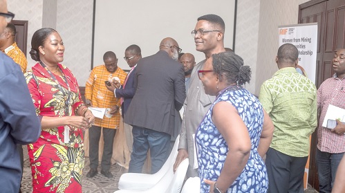 Justina Nelson (left), CEO, MIIF, interacting with representatives of CSOs after the engagement. Picture:DOUGLAS ANANE-FRIMPONG