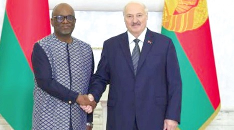 Dr Koma steem Jehu-Appiah with Aleksander Lukashenko, President of Belarus, after the presentation