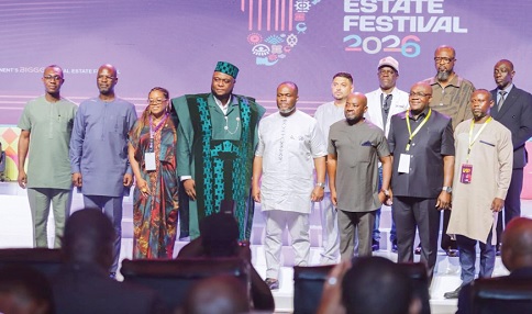 Kenneth Gilbert Adjei (4th from right), Minister of Works, Housing and Water Resources, with Desmond Kwesi Oteng (4th from left), founder and CEO of the Africa Real Estate Festival 2026, and other officials during the event