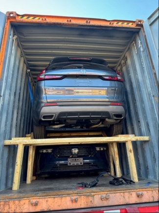 Stolen cars linked to the ring on shipping containers in Baltimore destined for Ghana. 
