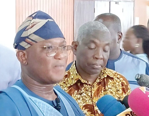 Alhassan Tampuli Sulemana (left) addressing the media in Parliament