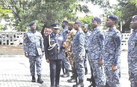 AC Theodore Kafui Ahiable inspecting the quarter guard formation mounted in his honour