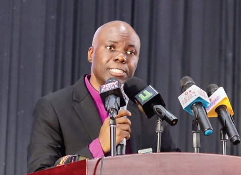 Rev. Victor Brew (inset), President of Ministers' Conference, Ghana Baptist Conference, speaking at the event