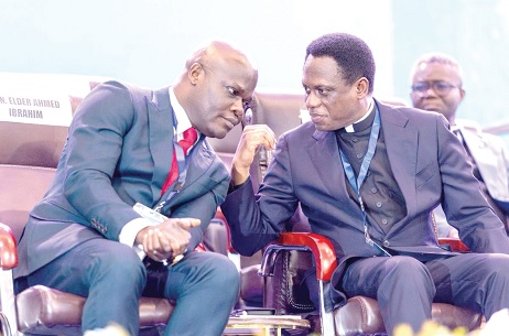 Ahmed Ibrahim (left), Minister of Local Government, Chieftaincy and Religious Affairs,  in a chat with Apostle Dr Eric Nyamekye, Chairman, Church of Pentecost, at the event