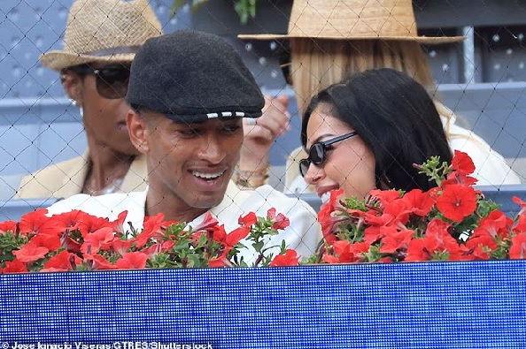 Bellingham and his model girlfriend shared a laugh between points in the first-round match