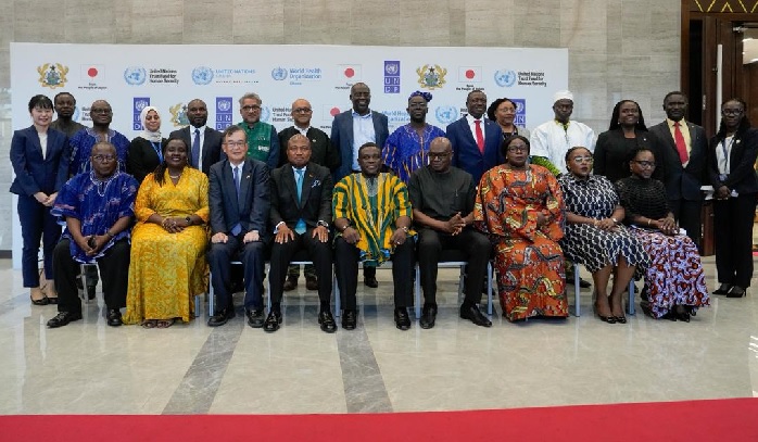 Hiroshi Yoshimoto (seated 3rd from left), Ambassador of Japan to Ghana, Samuel Okudzeto Ablakwa (seated 4th from left), Foreign Affairs Minister, Samuel Nartey George (5th from left), Communications Minister, Mr Prosper Bani (seated 4th from right), National Security Adviser at the Presidency and other dignitaries after the event