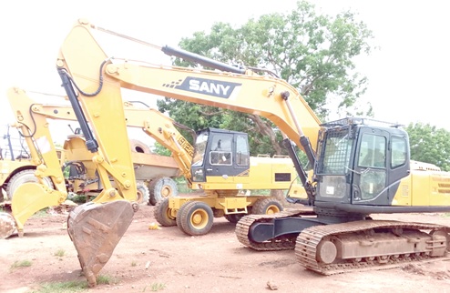 A fleet of training equipment, including excavators and a grader, at GIMS, providing hands-on experience for youth undergoing heavy-duty machinery training 