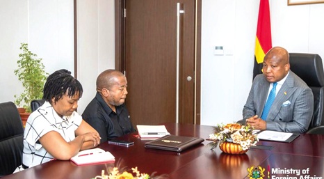 Samuel Okudzeto Ablakwa (right), Ghana's Foreign Affairs Minister, in a meeting with Thando Dalamba (middle), acting South African High Commissioner.
