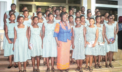Prof. Nana Aba Appiah Amfo (middle), Vice-Chancellor, UG, with some SHS students.