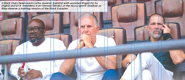 Black Stars head coach Carlos Queiroz (centre) with assistant Roger De Sa (right) and GFA  President, Kurt Simeon-Okraku at the Accra Sports Stadium as they observe a training session of the Black Galaxies