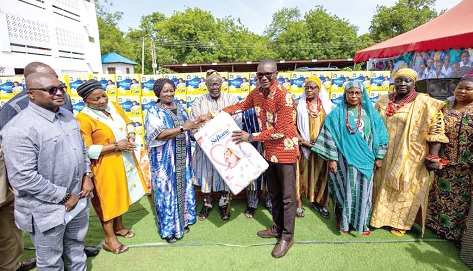 Prof. Naana Jane  Opoku-Agyemang (3rd from left), Vice-President, symbolically handing over the sanitary pads to the Ghana Health Service